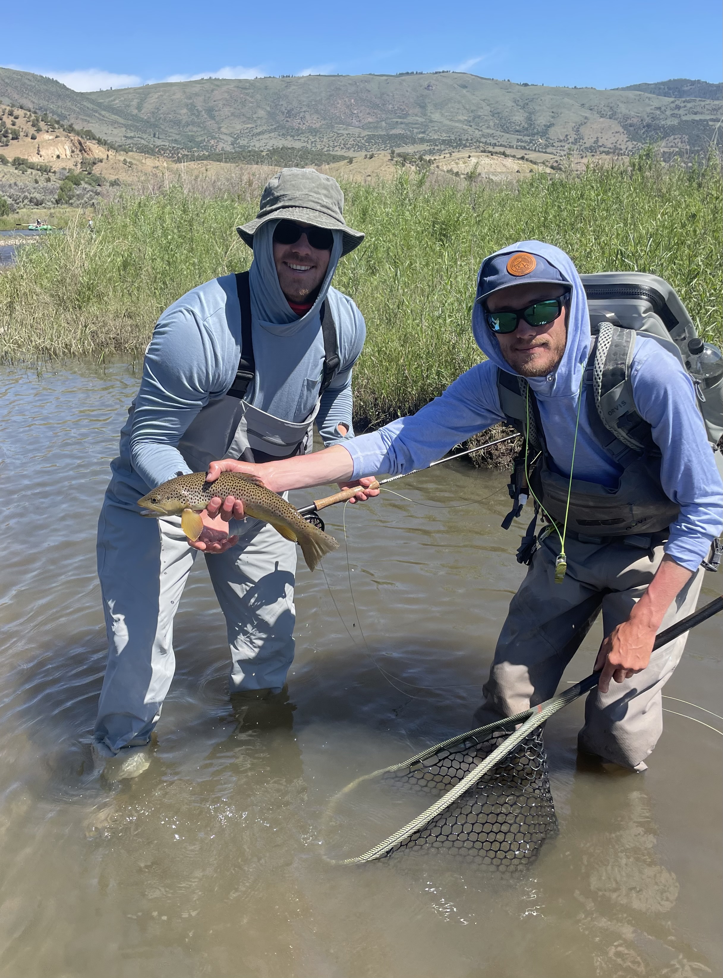 Guide and client, meadow water